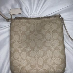 Authentic coach cross body